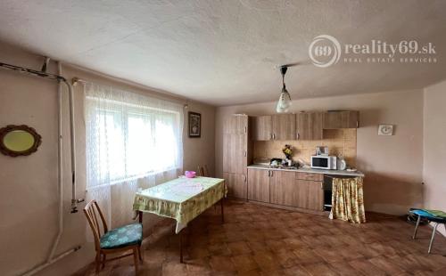 NIŽNÁ MYŠĽA - 4 IZBOVÝ RD V DOBROM STAVE, POZEMOK 538 M2.