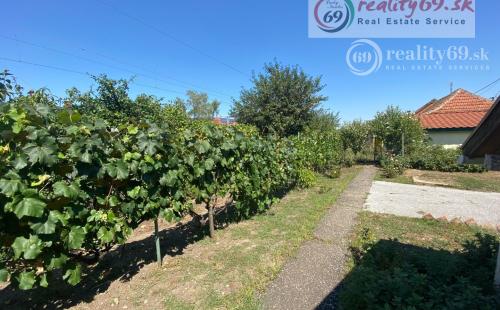 MAĎARSKO - ENCS - POLYFUNKČNÁ BUDOVA S 3 IZBOVÝM BYTOM